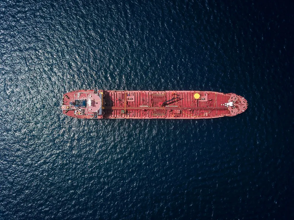 A laden container vessel under way, seen from above