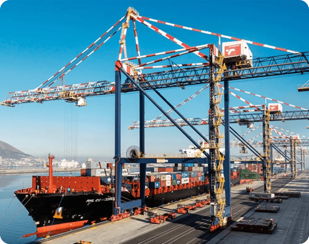 Ship-to-shore cranes and quay equipment working a vessel alongside